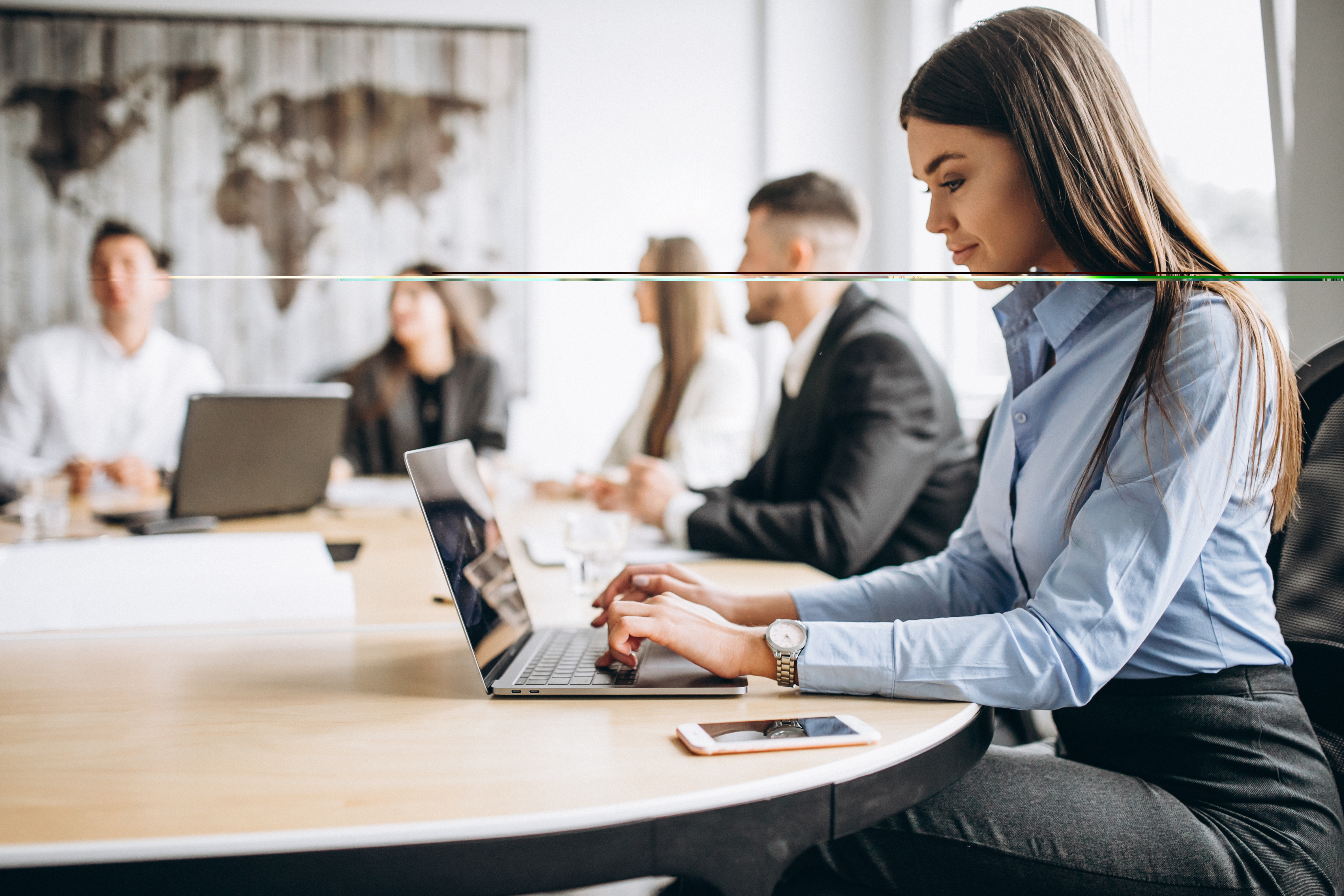 Group Of People Working Out Business Plan In An Office (1)
